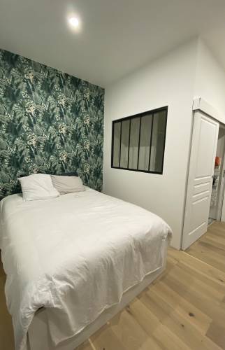 Extension pour accueillir un garage et une suite parentale au sein d'une maison bordelaise.