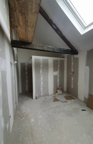 Pose du placoplâtre qui détermine le dressing