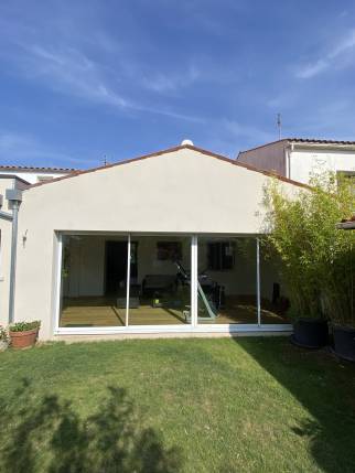 pose de grandes fenêtres