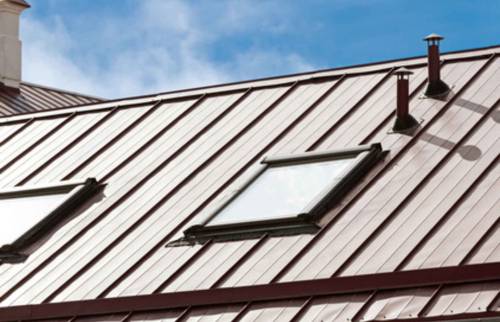 Toiture zinc avec fenêtres de toit