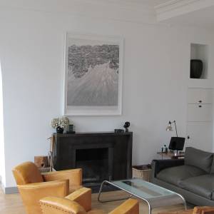 Aménagement d'un appartement de 180 m², Paris - Salon avec cheminée