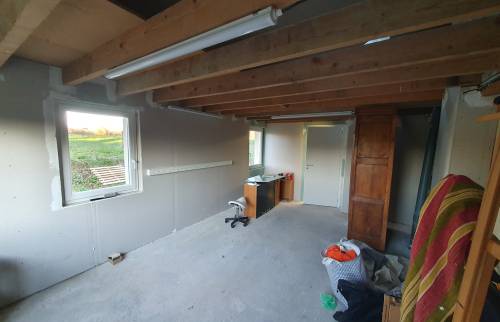 Rénovation de façade terminée en cours...