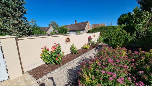 Le mur de clôture côté jardin