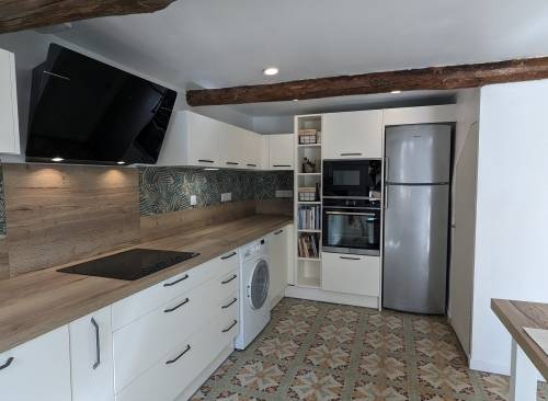 Un garage transformé en cuisine à Juvignac