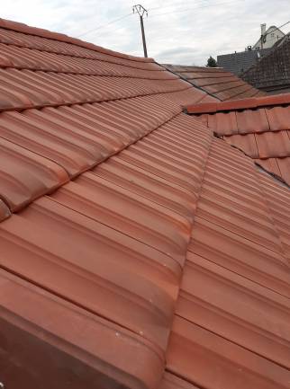 Rénovation de toiture à Village Neuf