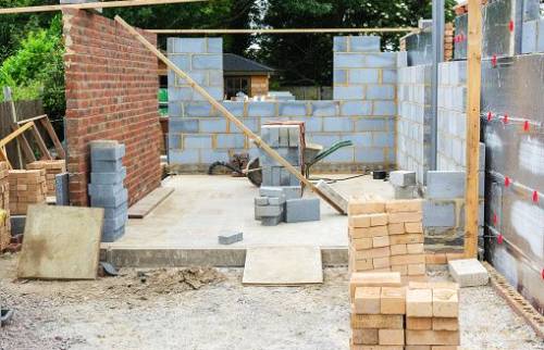 Coulage dalle de béton fondation et montage murs extension maison - Châteaulin - 29150 -