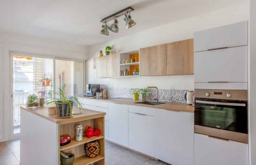 Rénovation d'un appartement avec cuisine ouverte sur l'espace séjour, Lyon 