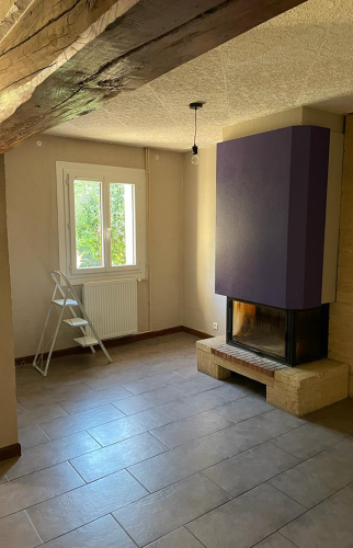 Installer d’un poêle dans une maison de Domarin