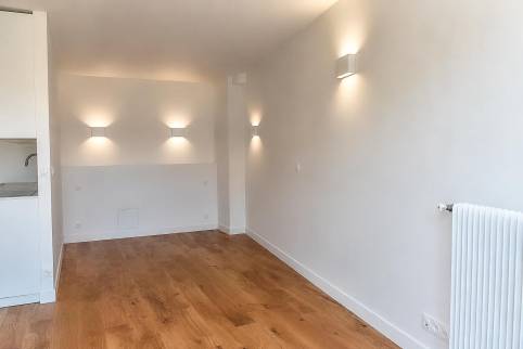 Espace de vie avec éclairage d'ambiance, résidence principale rénovée Paris 17