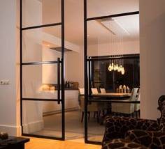 Cuisine ouverte sur le salon avec portes verrières à Palaiseau (91) 