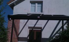 Construction d’une véranda en briques rouges