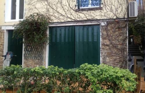 Extension d'une maison en bardage bois à Sèvres
