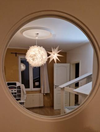 Verrière ronde dans chambre d'enfant à Saint Louis