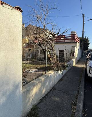 Grillage avant remplacement par un mur en maçonnerie - Bourg-lès-Valence 26500