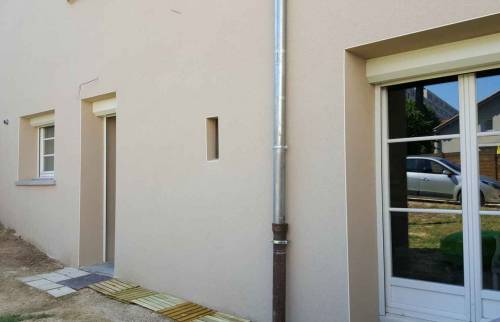 Ravalement d'une Façade en Pisé - Lyon / Francheville