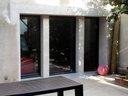 Transformation d'une fenêtre en porte-fenêtre près de Landerneau (29)