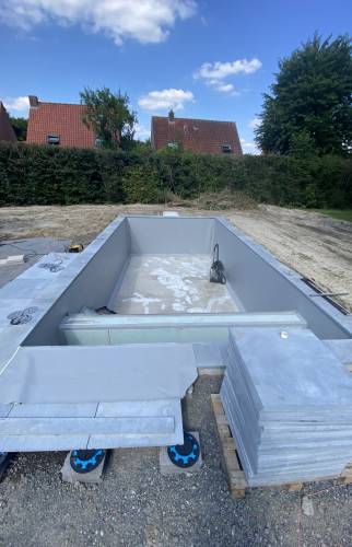 Mise en place de la feutrine recouverte d'une membrane armée