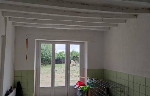 Boiseries et poutres d'une vieille maison à rénover dans la Sarthe