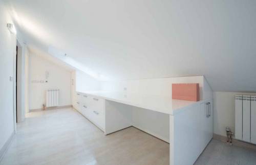 Un meuble sur-mesure pour optimiser l'espace - aménagement de combles - Vincennes (94300)