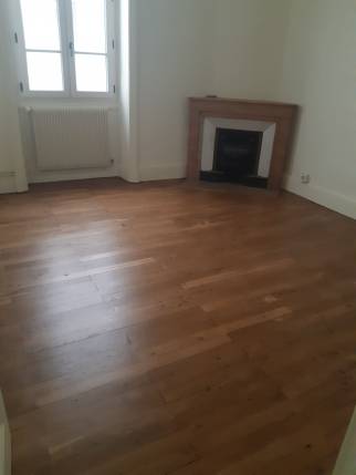 Parquet massif rénové dans un appartement rénové - Bourg-en-Bresse 01000