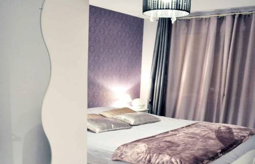 Rénovation d'un appartement à Sceaux chambre et éclairage