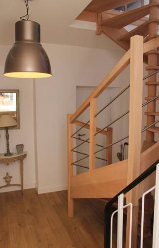 Rénovation de maison à Louannec - escalier en colimaçon sur mesure