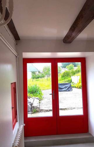 Agrandissement de l'ouverture mur pierre entre cuisine et jardin à Saint-Lunaire