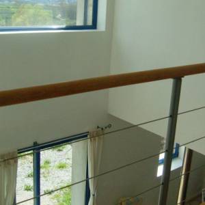 Réhabilitation et aménagement d'une maison en pierre - Passerelle