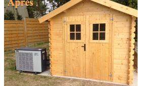 Chalet en bois abritant le système de chauffage de la piscine