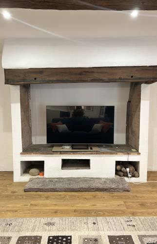 Cheminée modernisée après rénovation à La Guerche-de-Bretagne