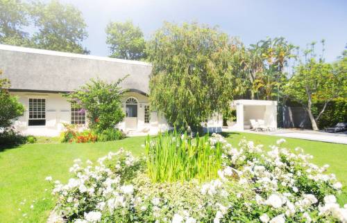 chaumiere avec jardin