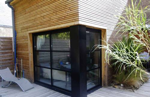 Baie vitrée noire en alu