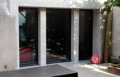 Façade arrière après ravalement et pose des baies vitrées - Jatxou - 64480 - 