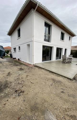 Extension pour accueillir un garage et une suite parentale au sein d'une maison bordelaise.