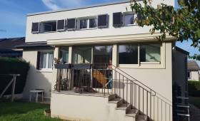 Surélévation de maison avec ouvertures en façade
