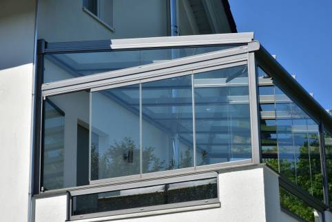 Extension avec une véranda en aluminium sur garage