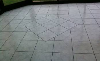 Plancher chauffant reversible revêtement grès cérame dans une véranda - Saint-Ouen-l’Aumône (95310)