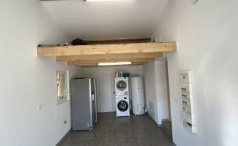 Aménagement garage en buanderie cellier La Maison Des Travaux Ales