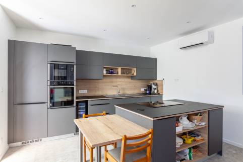 Rénovation d'une maison de famille avec construction d'un garage double