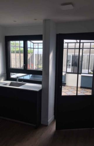 Cuisine avec menuiseries après travaux de rénovation - Nantes 44