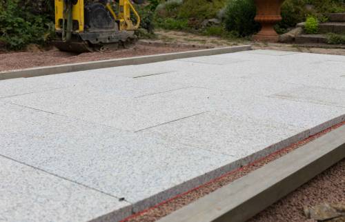 Création d'une terrasse en dalles gravillonnées à St Pair Sur Mer (50380)