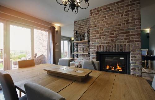 insert cheminée brique Bouc Bel Air - La Maison des Travaux