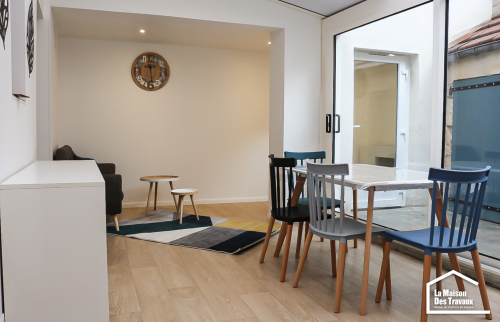 Véranda aménagée en salon