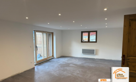 garage transformé en salon, création skiroom Bozel, carrelage skiroom, optimisation espace maison, courtier en travaux Savoie