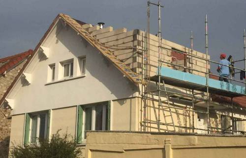 Maison en cours de surélévation partielle de toiture (91)