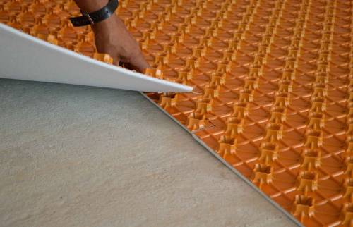 Installation couche isolant plancher chauffant hydraulique (91)