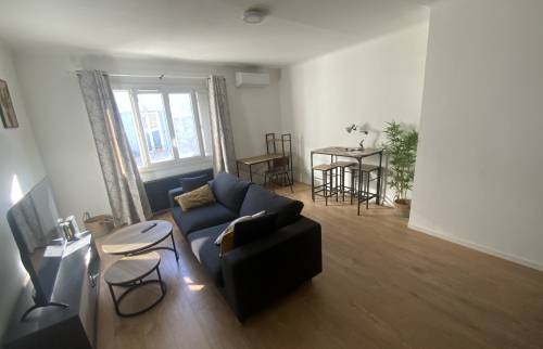 Salon appartement locatif rénové La Maison Des Travaux Ales