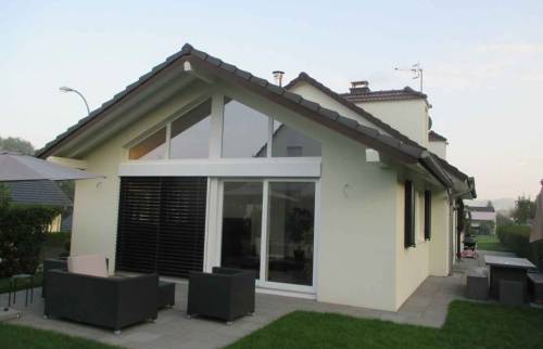 Extension de maison, terrasse en dalle, baie vitrée à Saint Louis