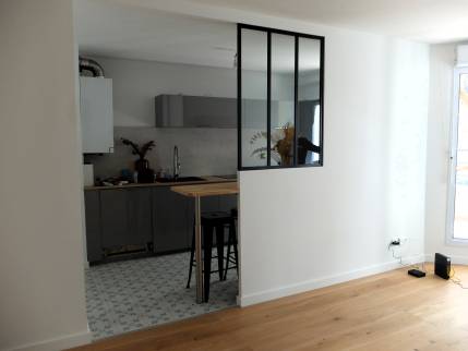 Lyon (69009) : rénovation d'appartement avec cuisine ouverte sur séjour et verrière d'atelier