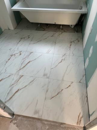  Création de salle de bain avec pose de carrelage effet marbre - Nantes 44000